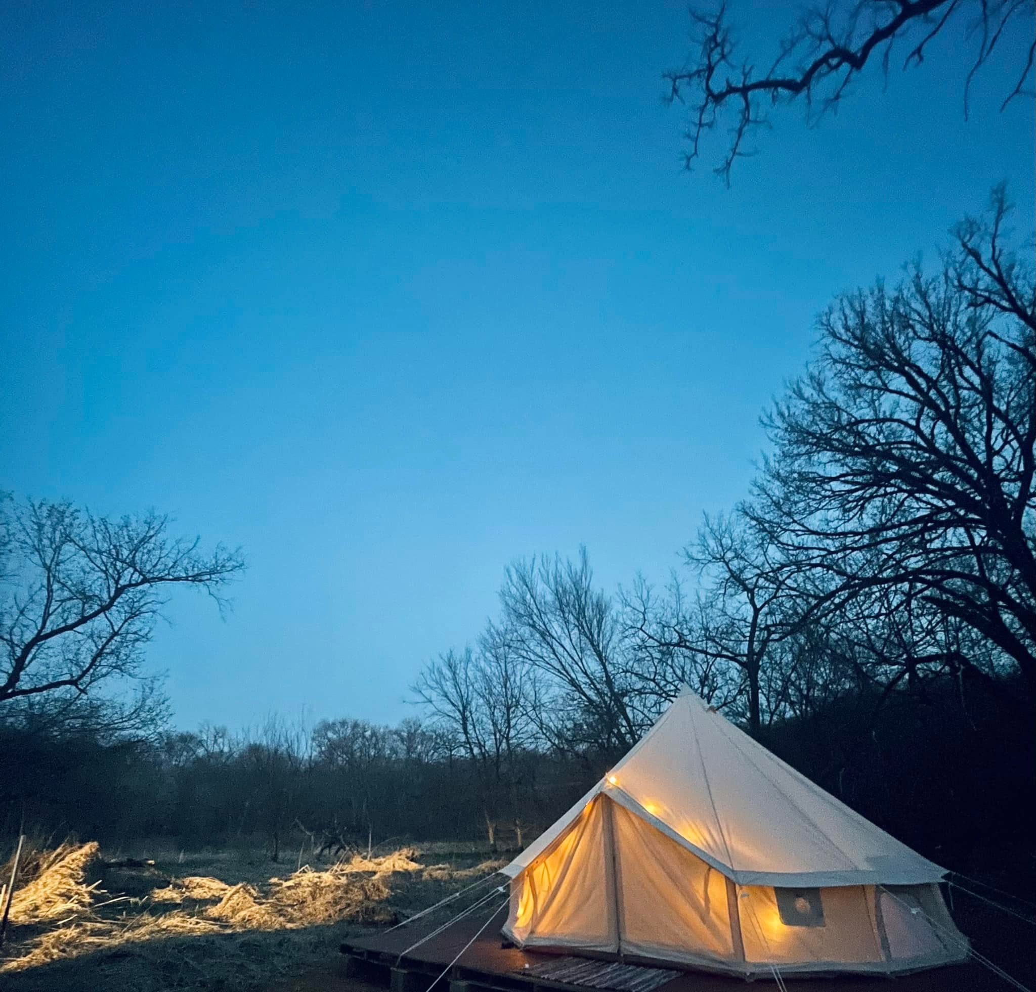 Tent exterior at dusk